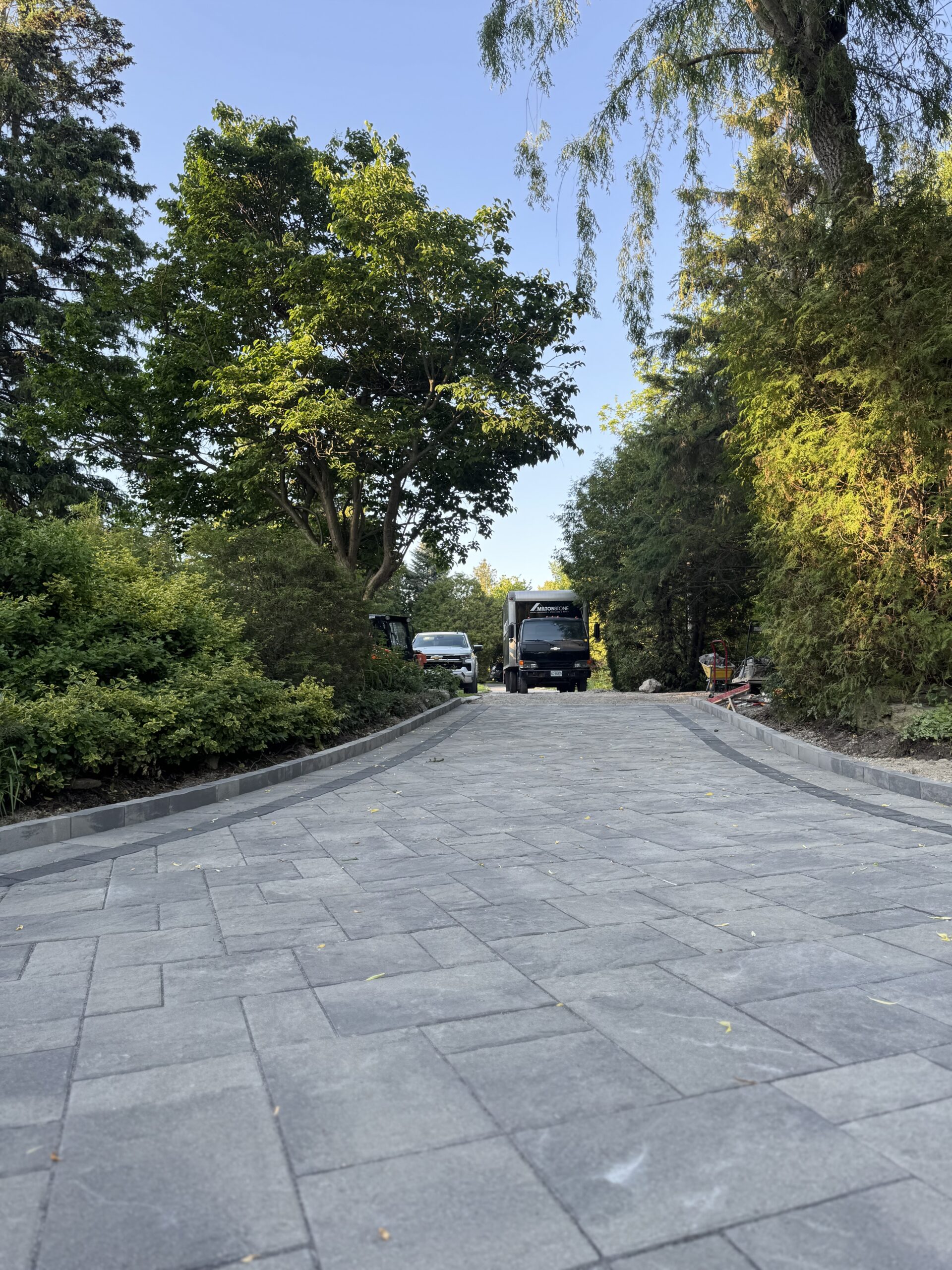 Grey interlocking pavers and entrance steps