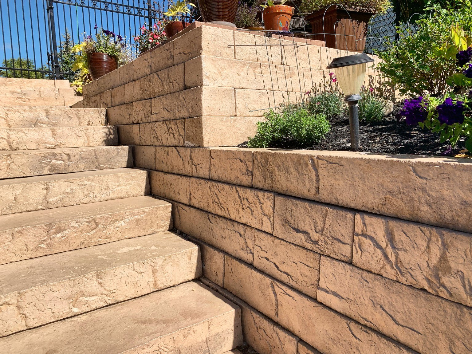 Poolside staircase and terraced walls in Milton