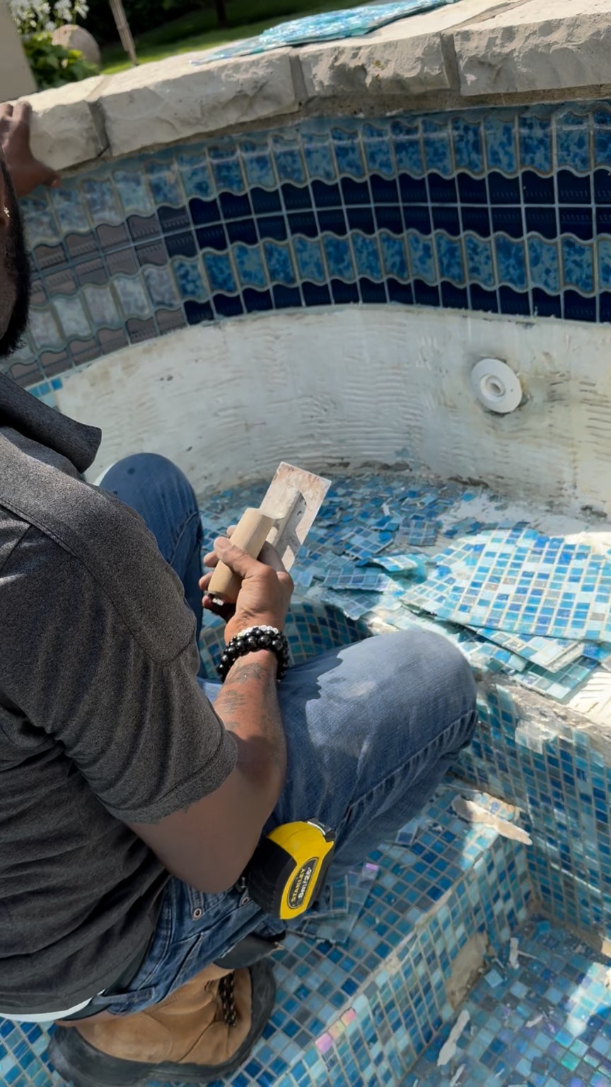 Spa tile removal in progress